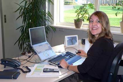 Sales representative Madeline Kroesbergen uses the Visual LANSA solution on her laptop